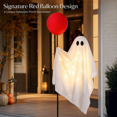 Power Your Lawn ghost lit at night enhancing Halloween atmosphere outdoors