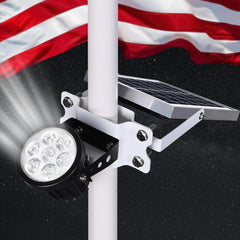 PPQ flag pole light front view showing compact weatherproof housing and even beam