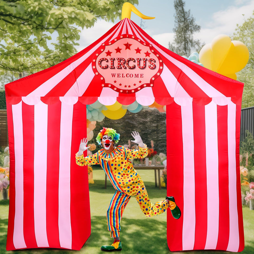 Preboun front view of circus archway showing bold red white colors and instant welcome
