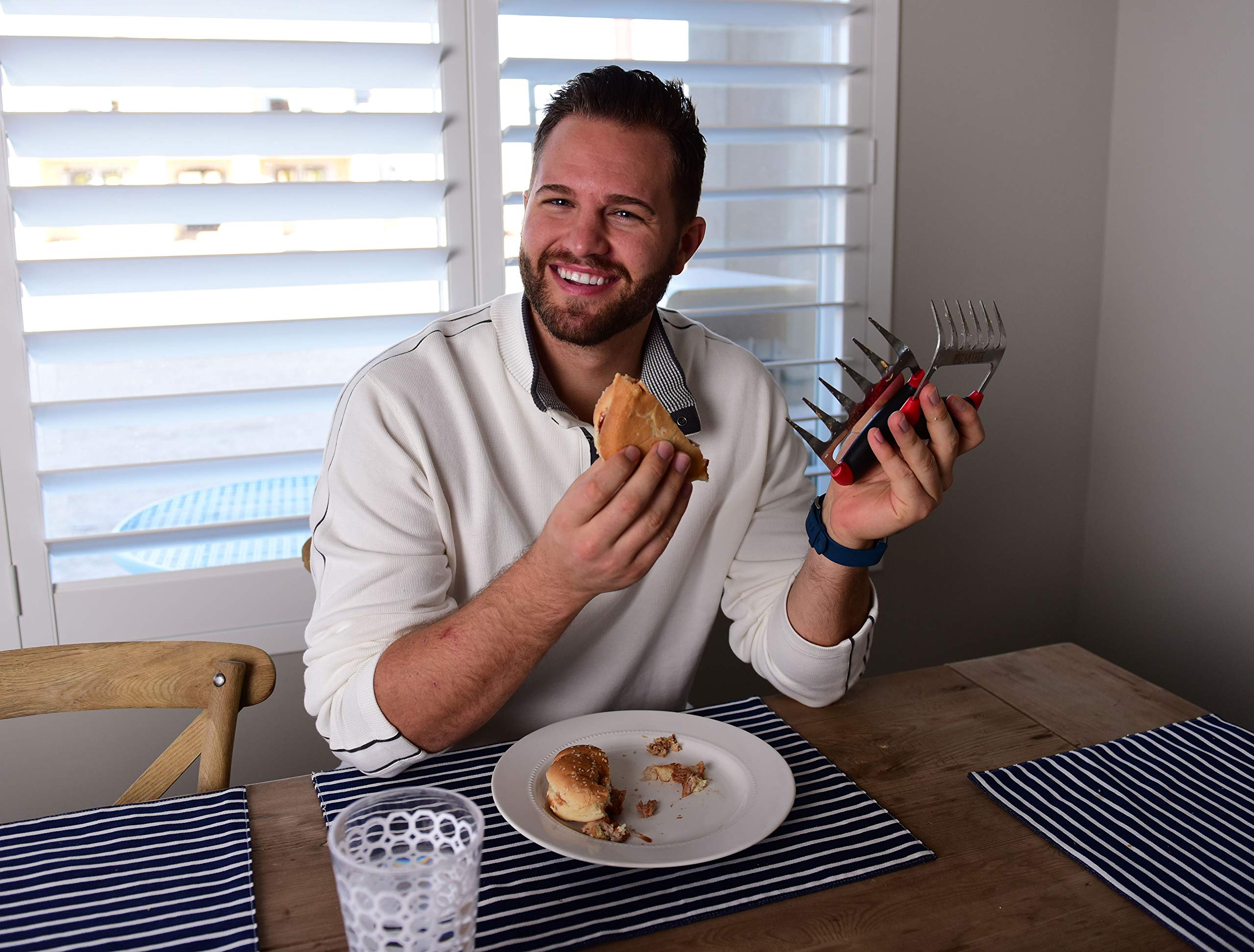 Premiala ergonomic soft-touch handle shown being gripped for comfortable control