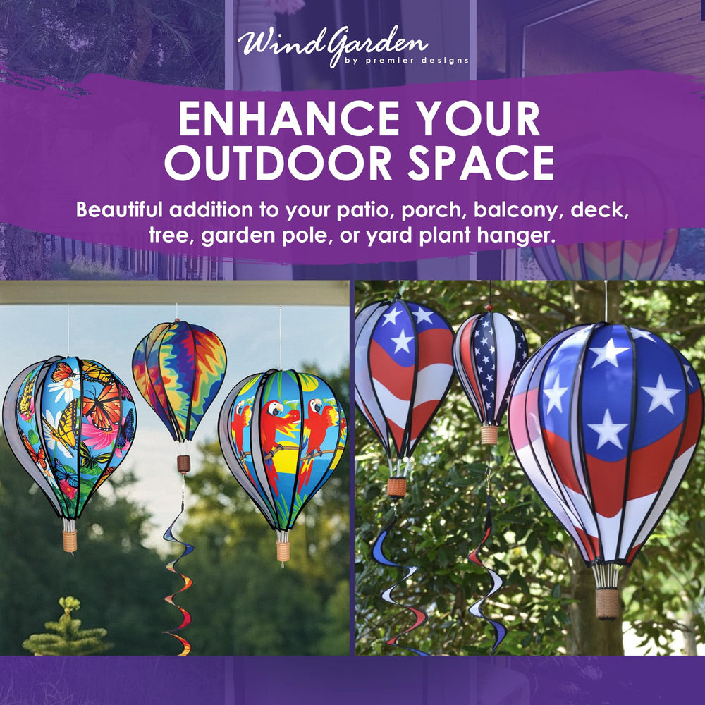 Premier Kites hanging on porch rail in garden adding patriotic flair and visual interest