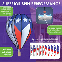 Premier Kites spinner held by hand to show 26-inch scale and lightweight convenience