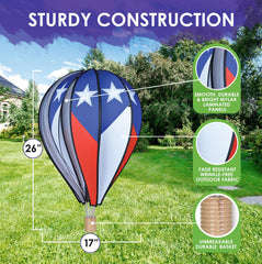 Premier Kites side profile spinner rotating in breeze to create eye-catching yard movement