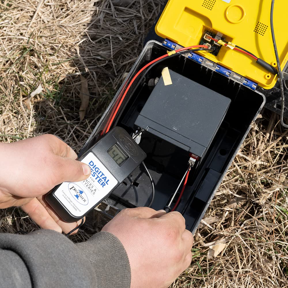 Premier 1 Supplies tester in use on an electric fence post, quick field troubleshooting