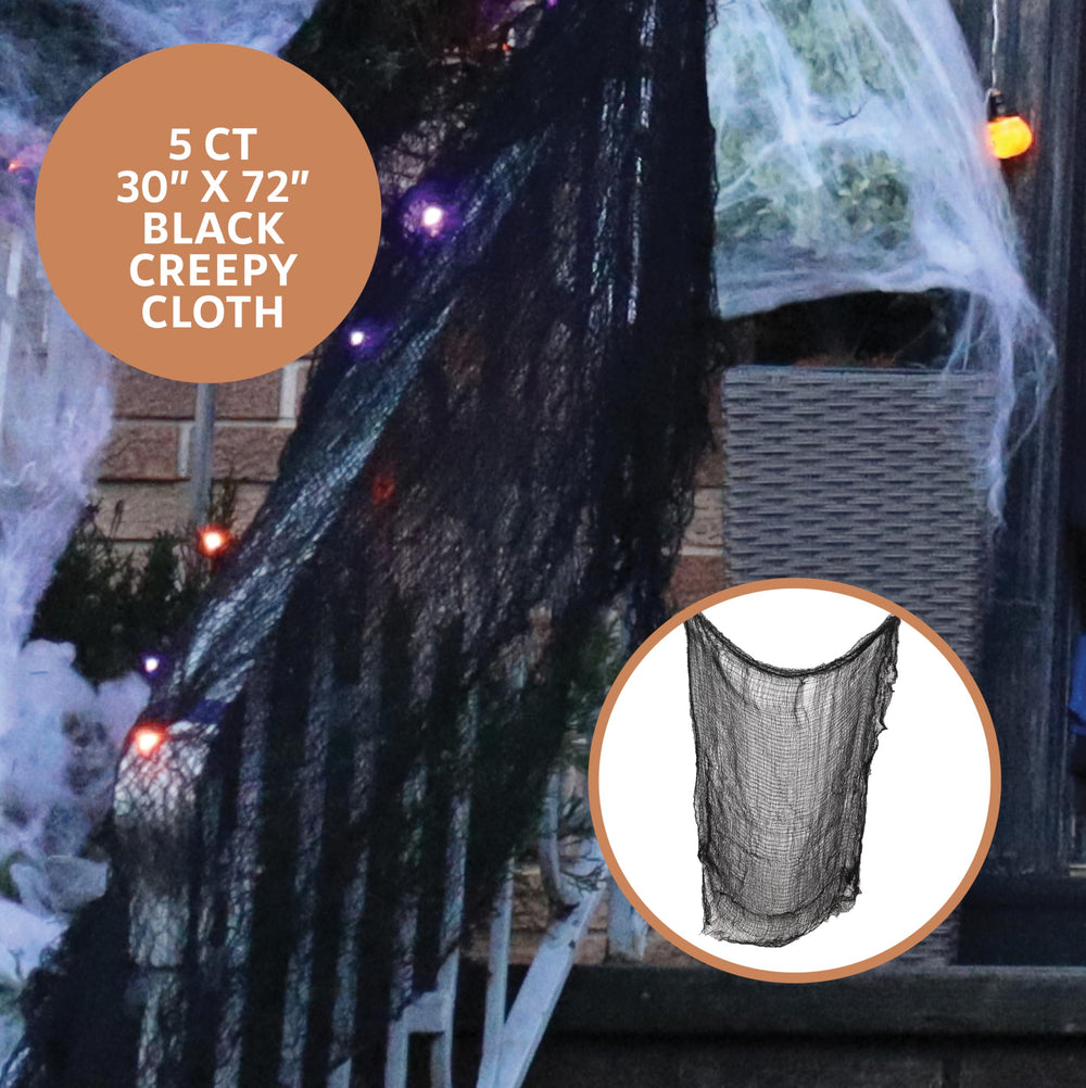 Premium Innovations stretched spider webbing with realistic spiders for haunted effect
