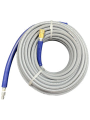Pressure-Pro coiled hose on driveway showing 100 ft reach and storage benefit
