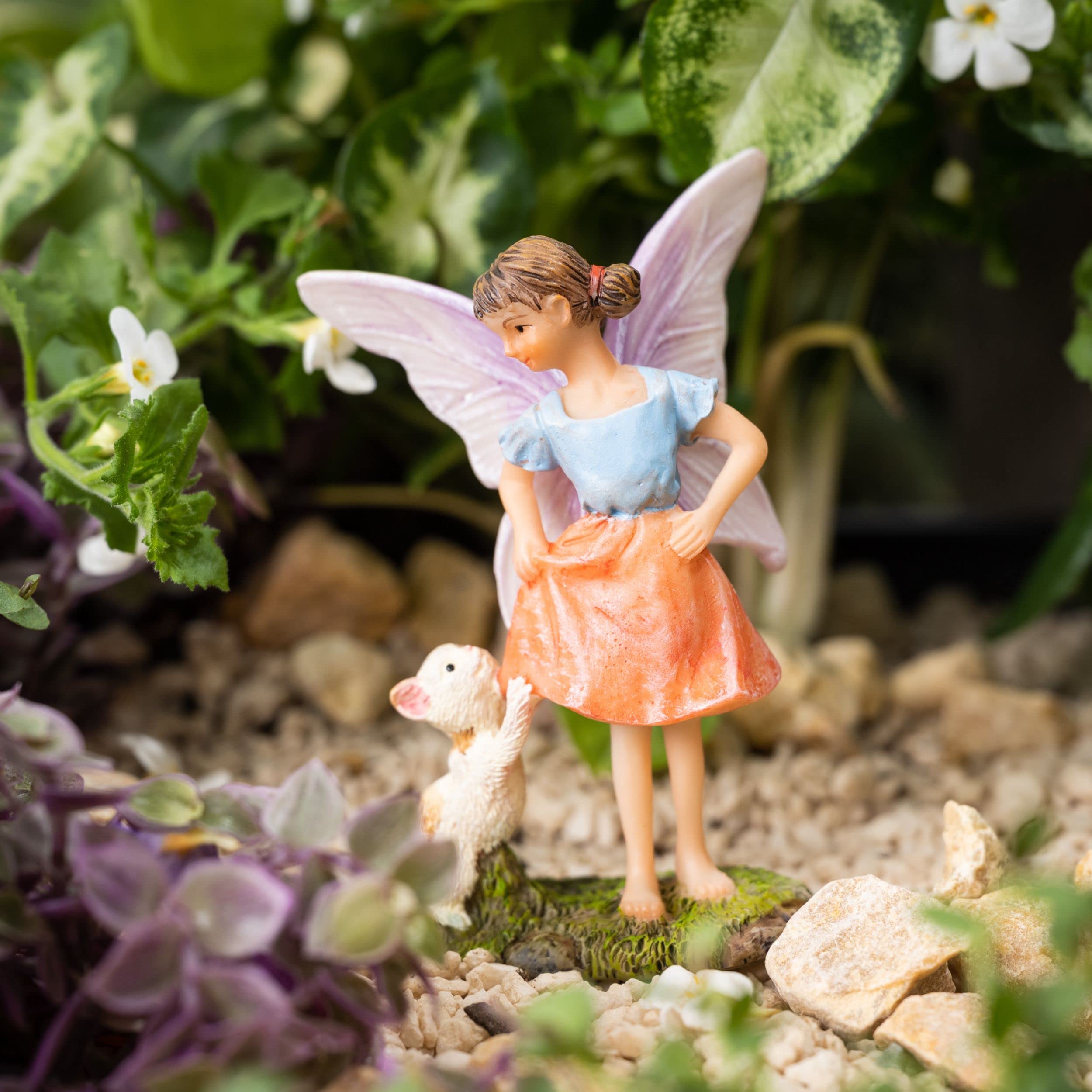 PRETMANNS child placing fairies encouraging imaginative play