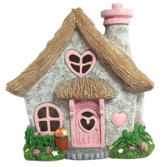 PRETMANNS front view of pink fairy house showing cottage charm and curb appeal