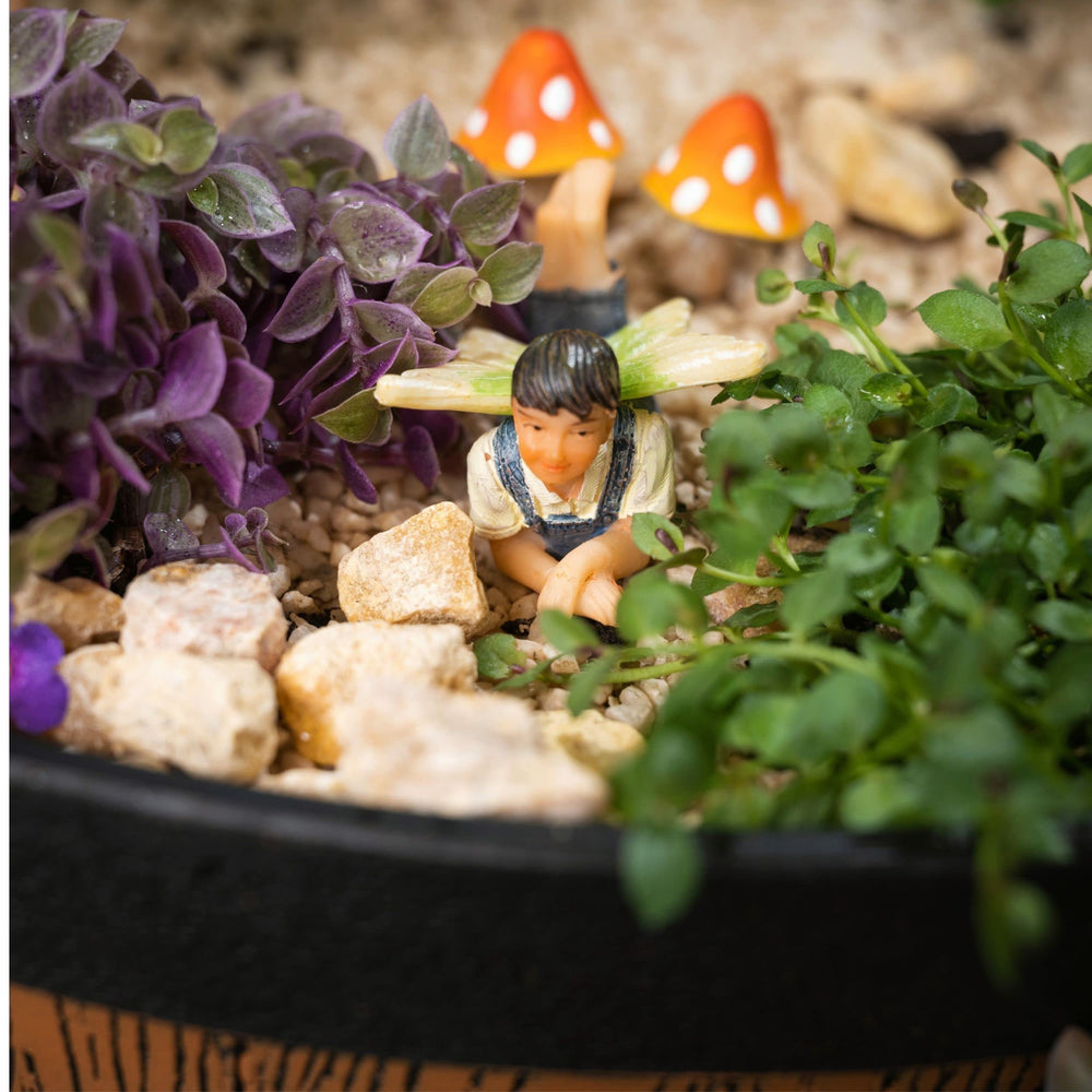 PRETMANNS miniature scene on rock garden showing integrated natural styling