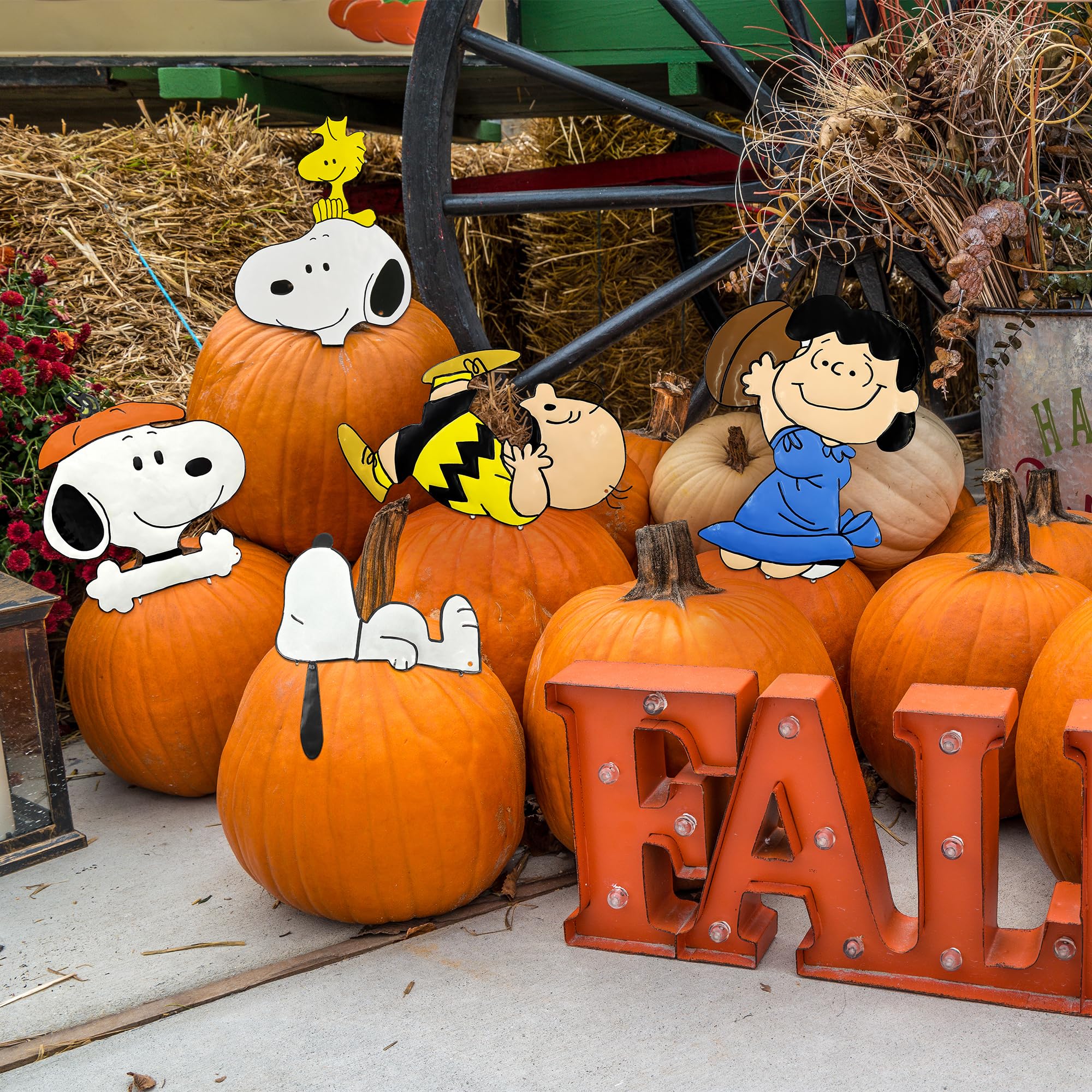 PRODUCTWORKS press-ins in a porch pumpkin display add instant festive curb appeal