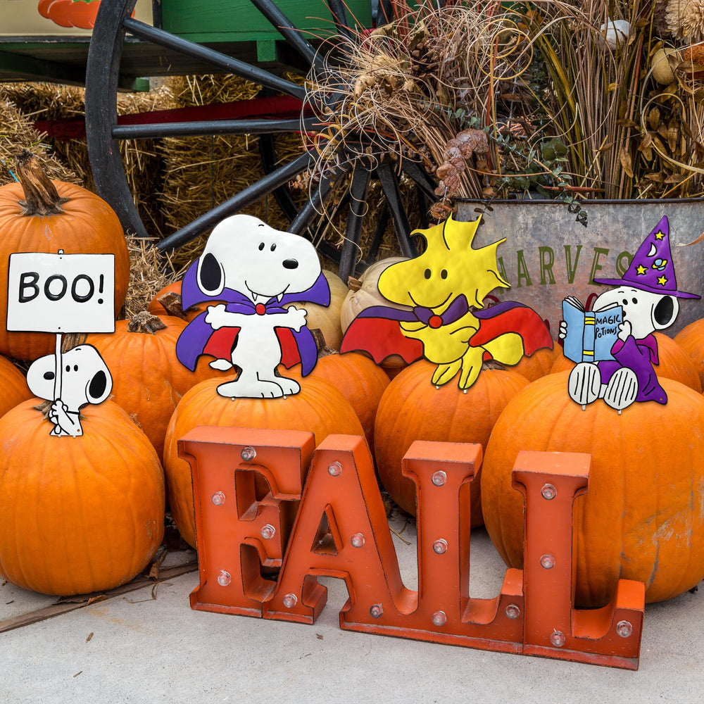 PRODUCTWORKS Snoopy beside ruler for scale showing size for porch or tabletop