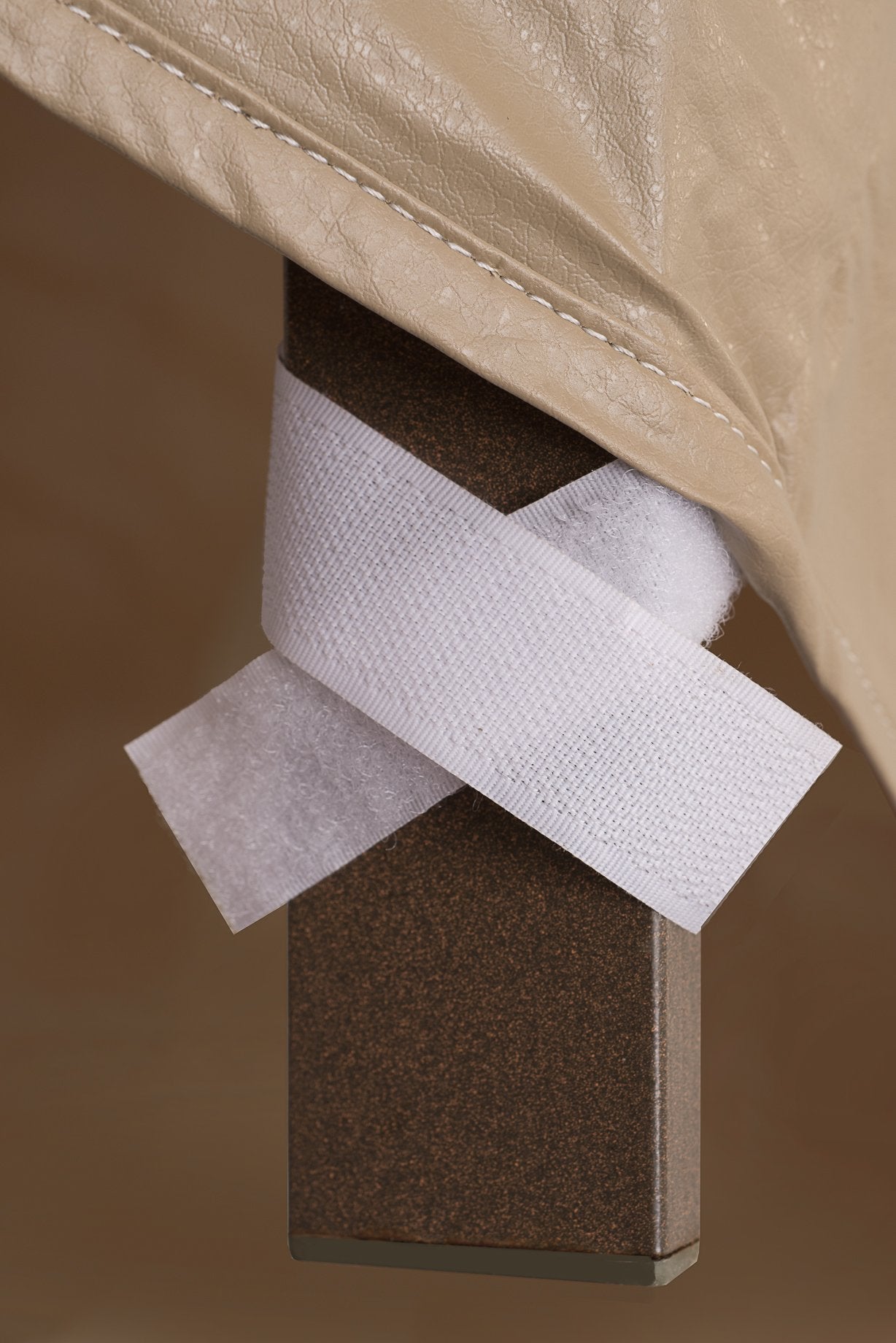 Protective Covers on a patio wicker chair in use protecting from sun and rain