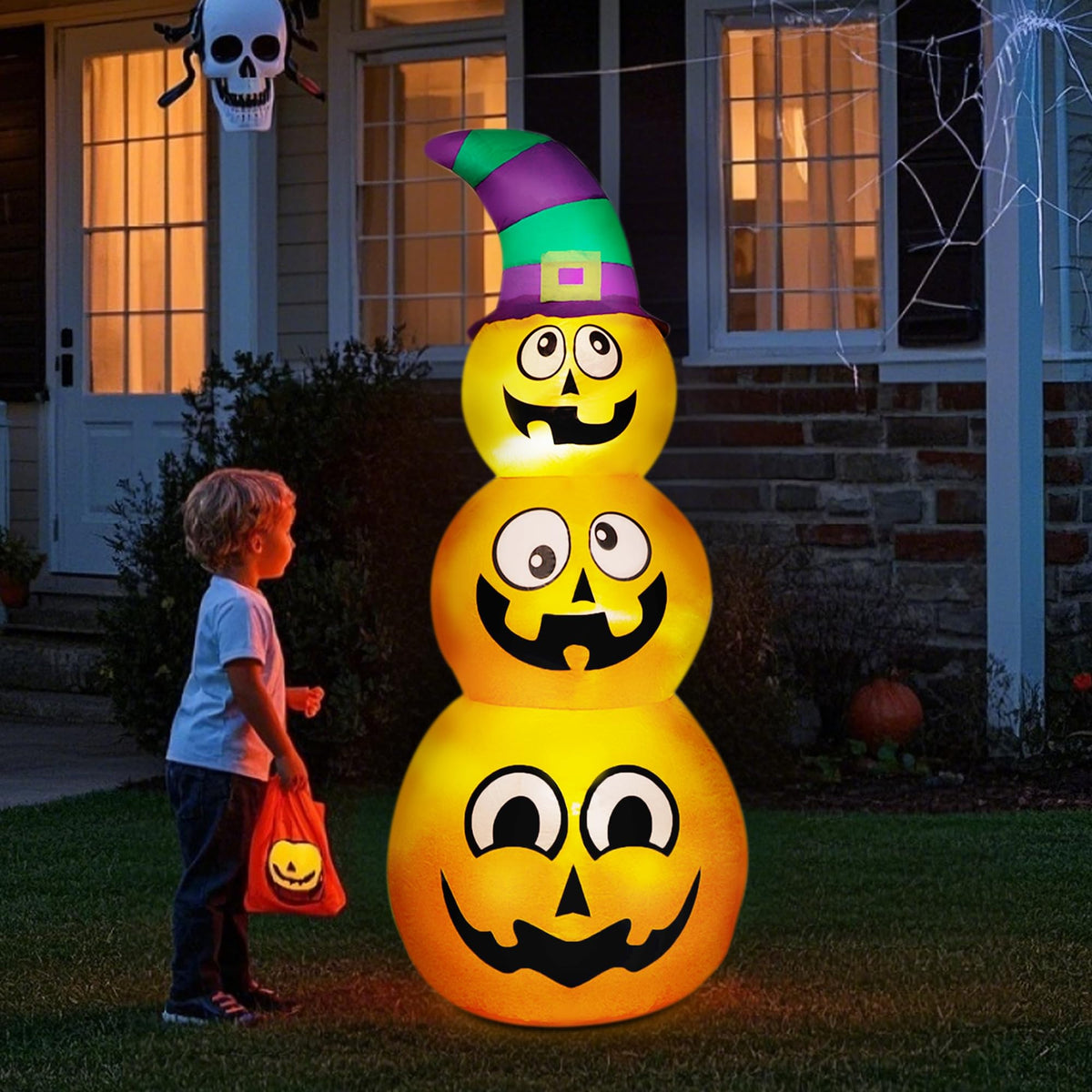 Prsildan front view of stacked pumpkins showing cheerful Halloween curb appeal