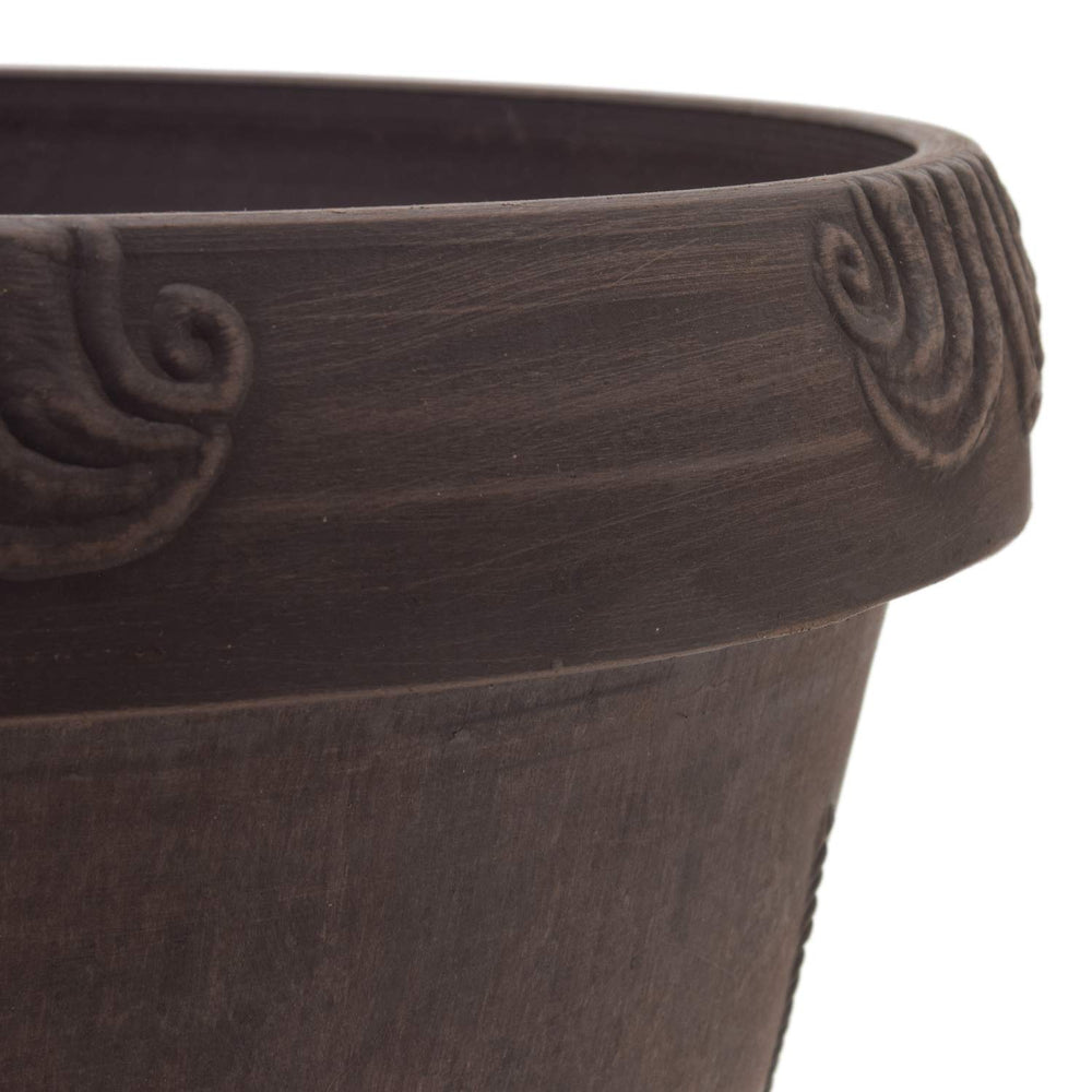PSW Pot Collection dragonfly planter staged with lush foliage on patio, shows versatility