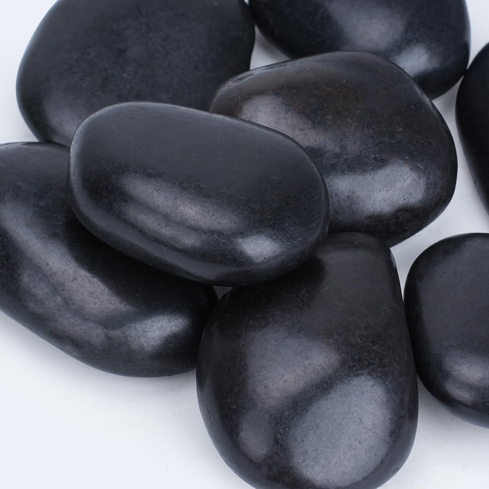Pulovin front packaging showing 20 lbs bag and tidy black stones, enhances curb appeal