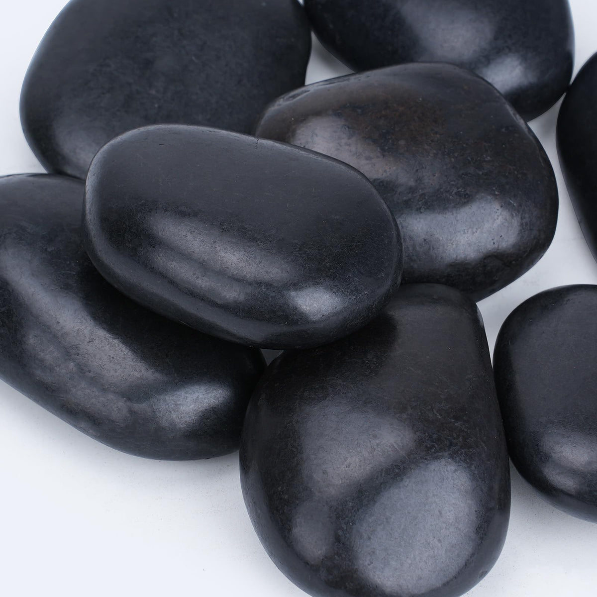 Pulovin front packaging showing 20 lbs bag and tidy black stones, enhances curb appeal