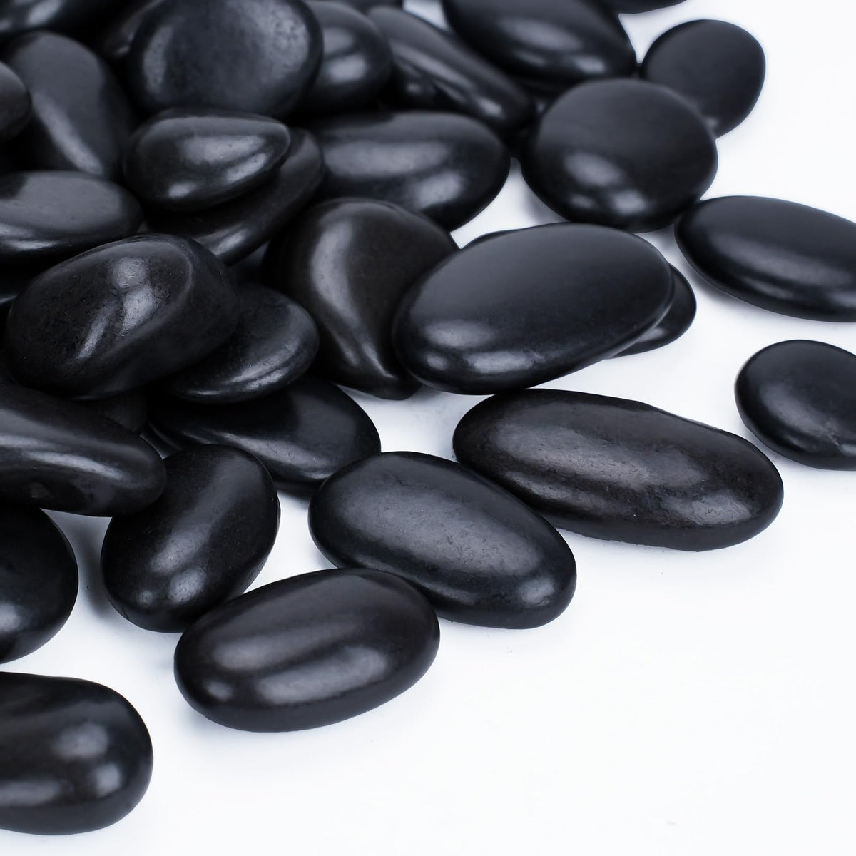 Pulovin bag front packaging showing 30 lb black river rocks and clear labeling benefit