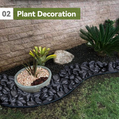 Pulovin stones installed in landscape bed protecting soil and improving contrast