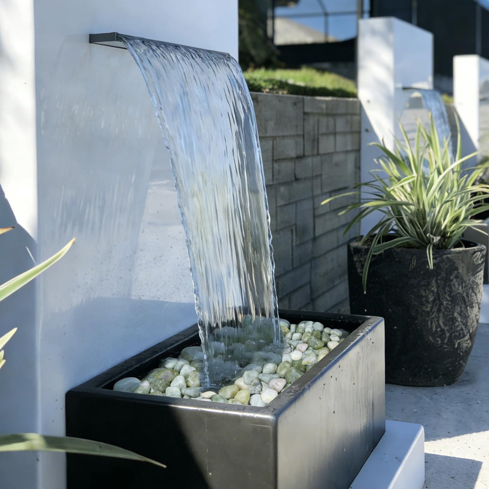Pulovin pebbles layered in a vase for stable decorative support
