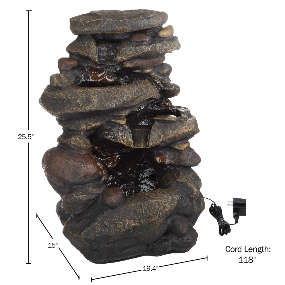 Pure Garden fountain placed on patio with plants, enhances outdoor décor and ambiance