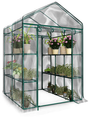Pure Garden front view showing greenhouse with clear PVC cover and door, protecting plants