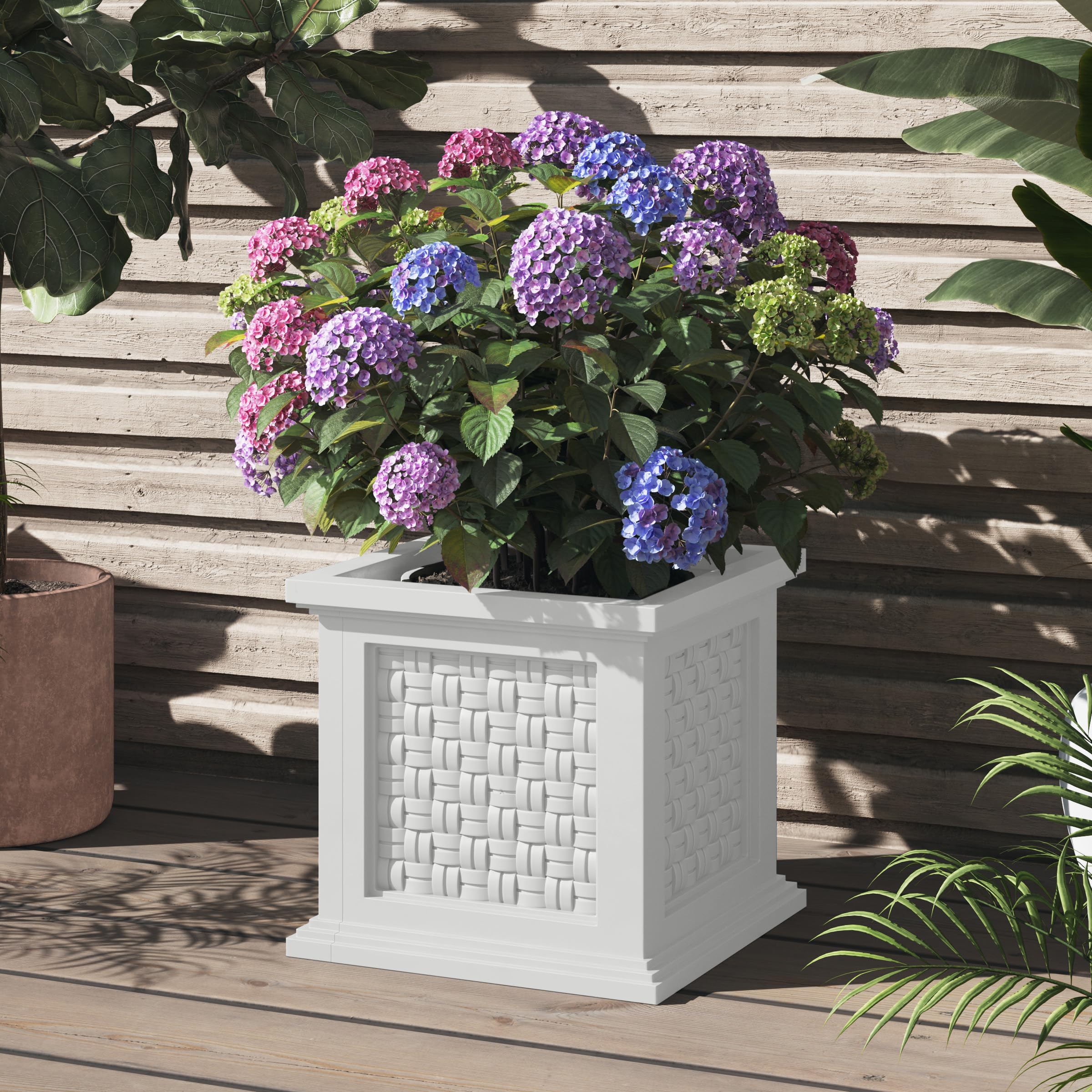 Pure Garden planter containing a potted plant illustrating versatile planting options