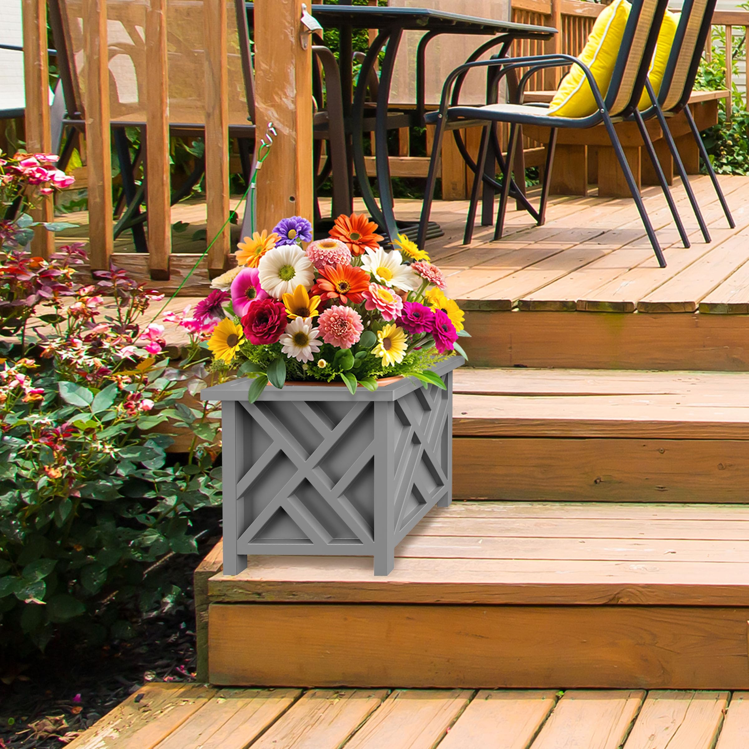Pure Garden planter next to potted plant showing interior capacity