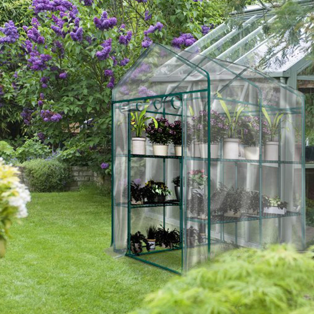 Pure Garden beside a watering can for size comparison and space planning