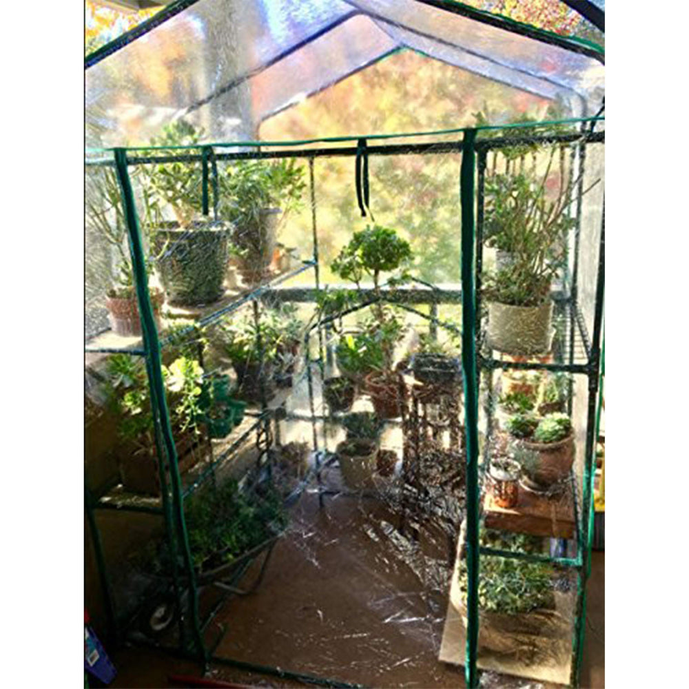 Pure Garden size comparison with person to show 56 x 56 x 76-inch scale and space-saving benefit