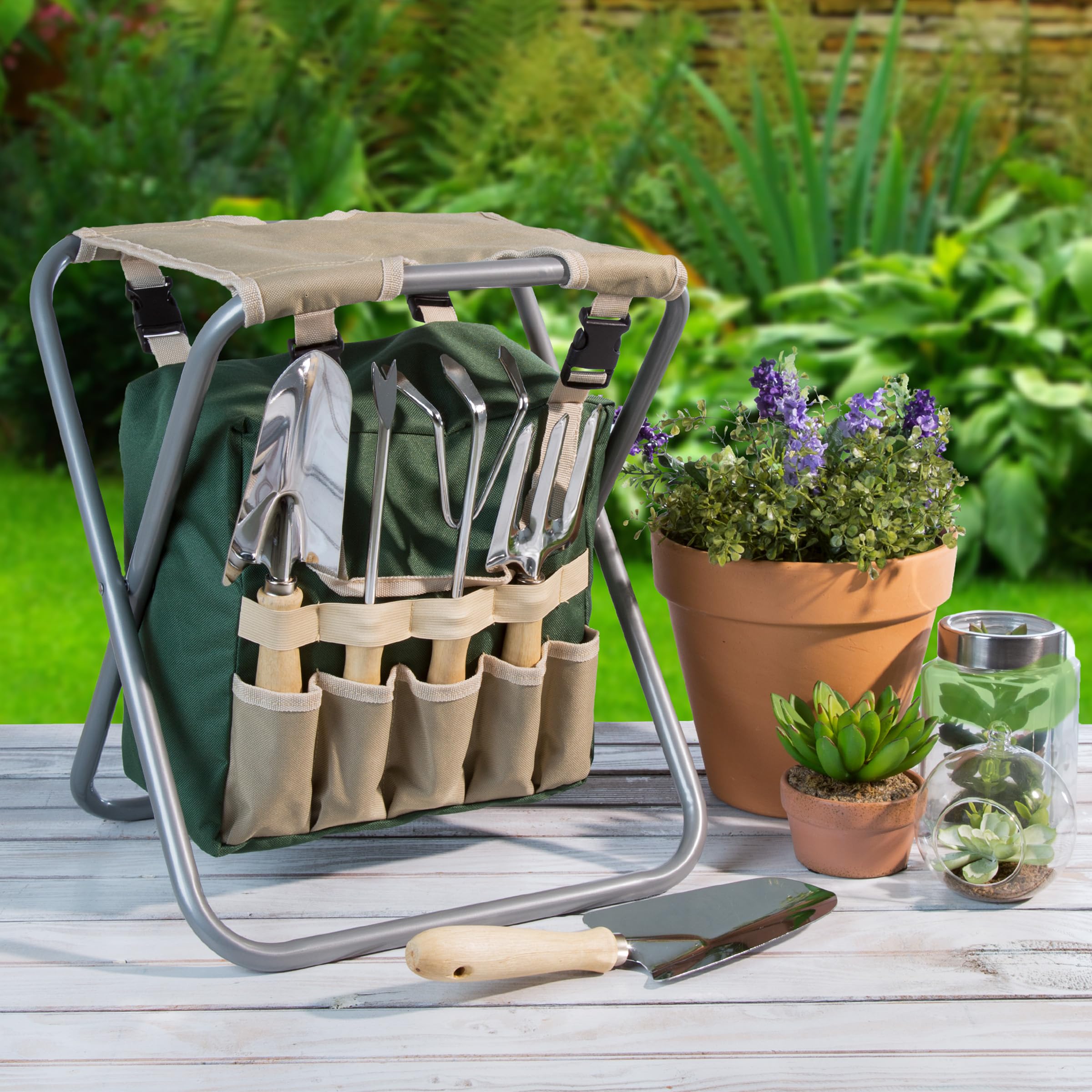 Pure Garden size comparison beside hand to show scale and portability