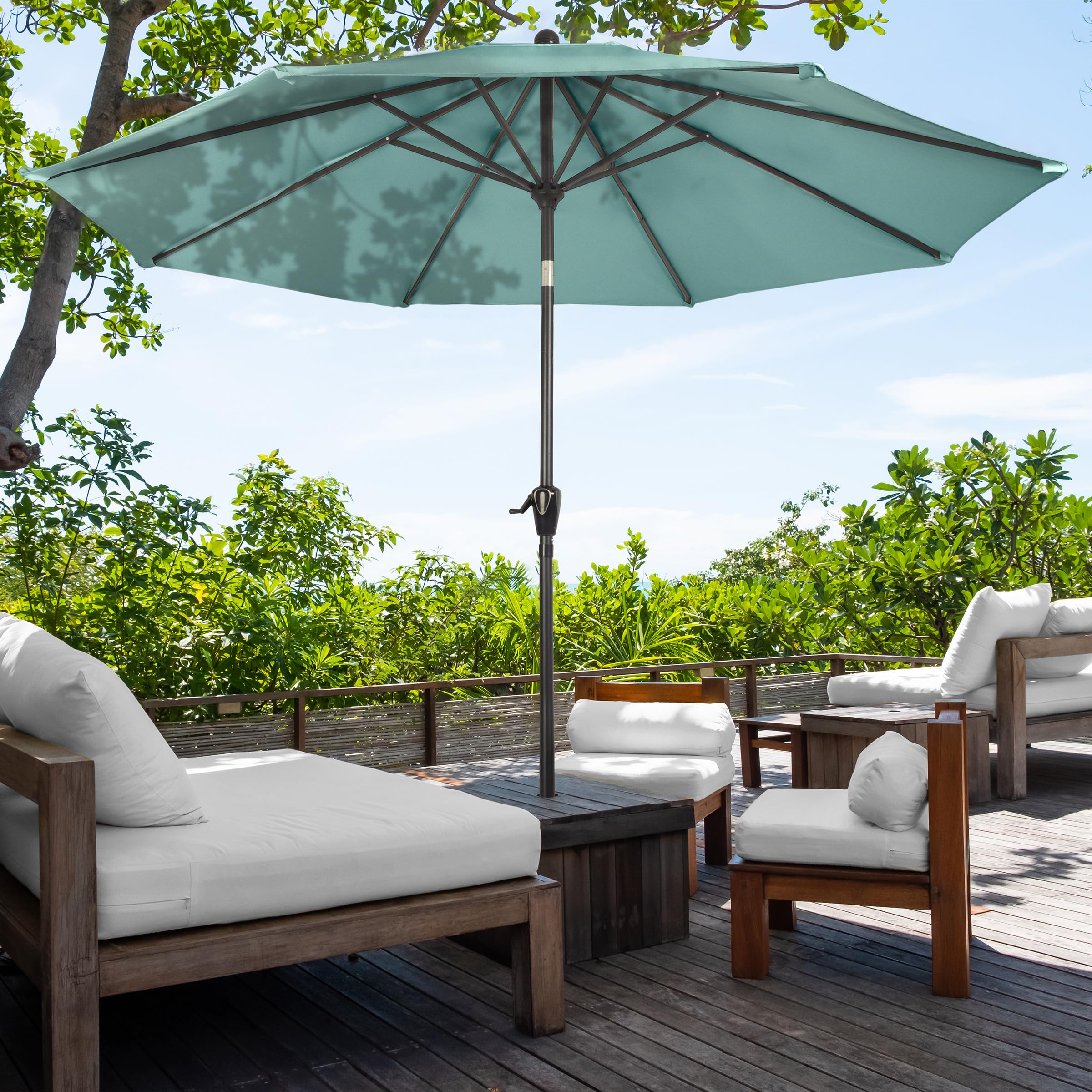 Pure Garden umbrella beside a table illustrating scale and seating coverage advantage