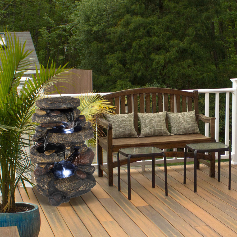 Pure Garden close-up of faux-stone texture and water flow, highlights realistic finish