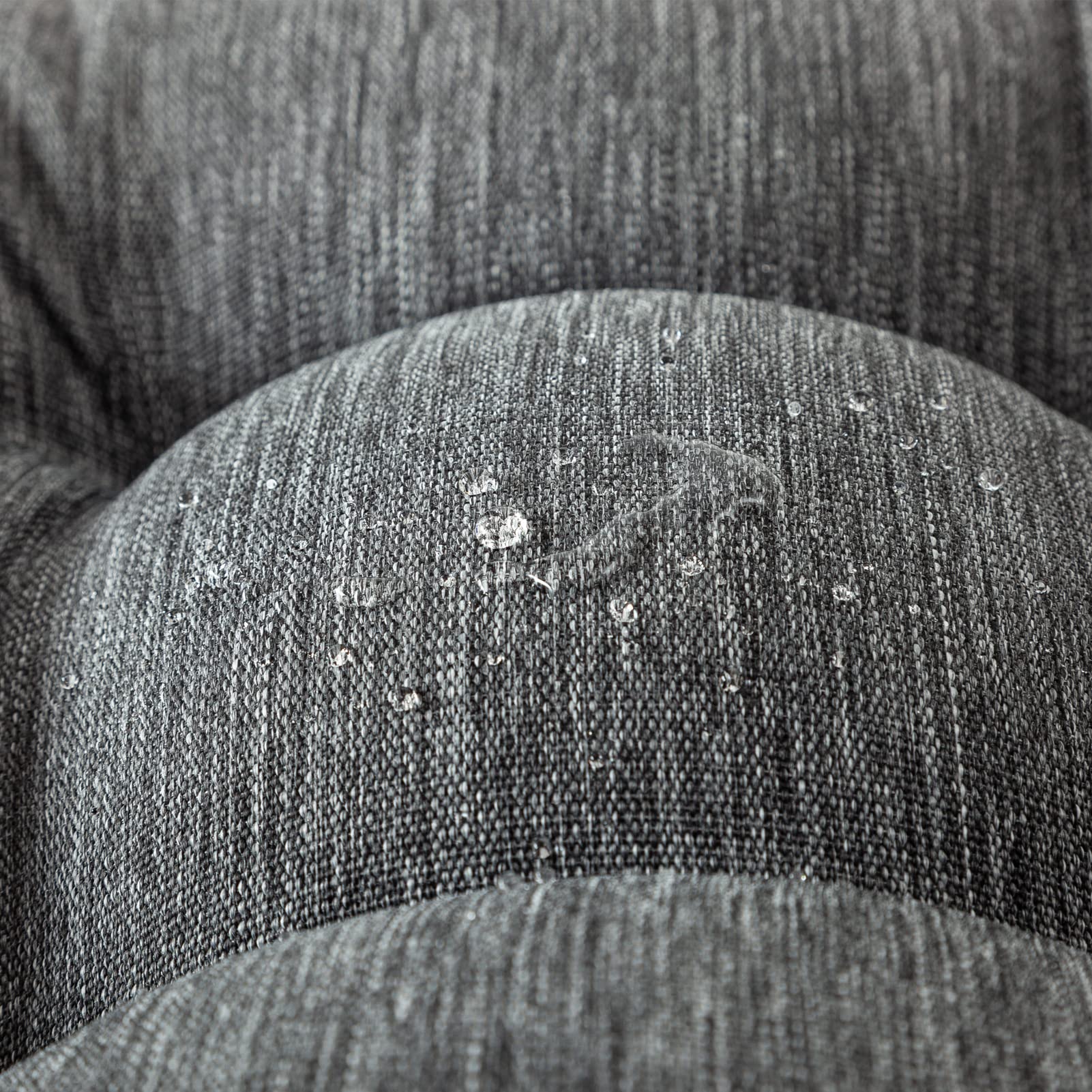 QILLOWAY cushions styled on wicker loveseat demonstrating comfortable outdoor seating