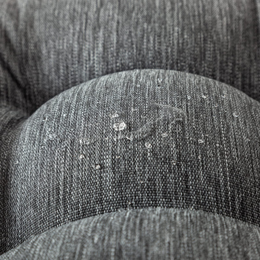QILLOWAY cushions styled on wicker loveseat demonstrating comfortable outdoor seating