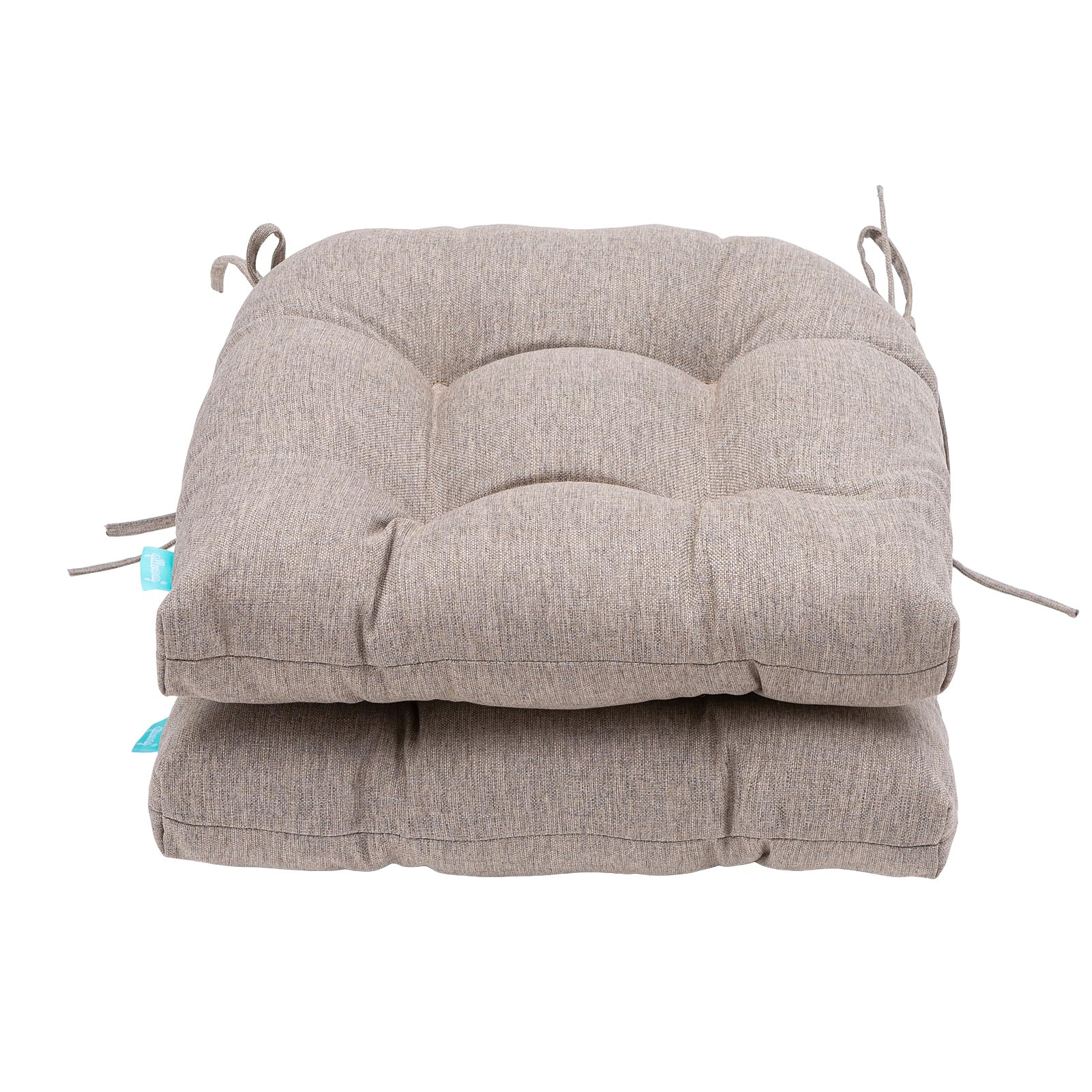 QILLOWAY cushions styled on a patio loveseat creating a comfy outdoor seating scene