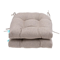 QILLOWAY cushions styled on a patio loveseat creating a comfy outdoor seating scene