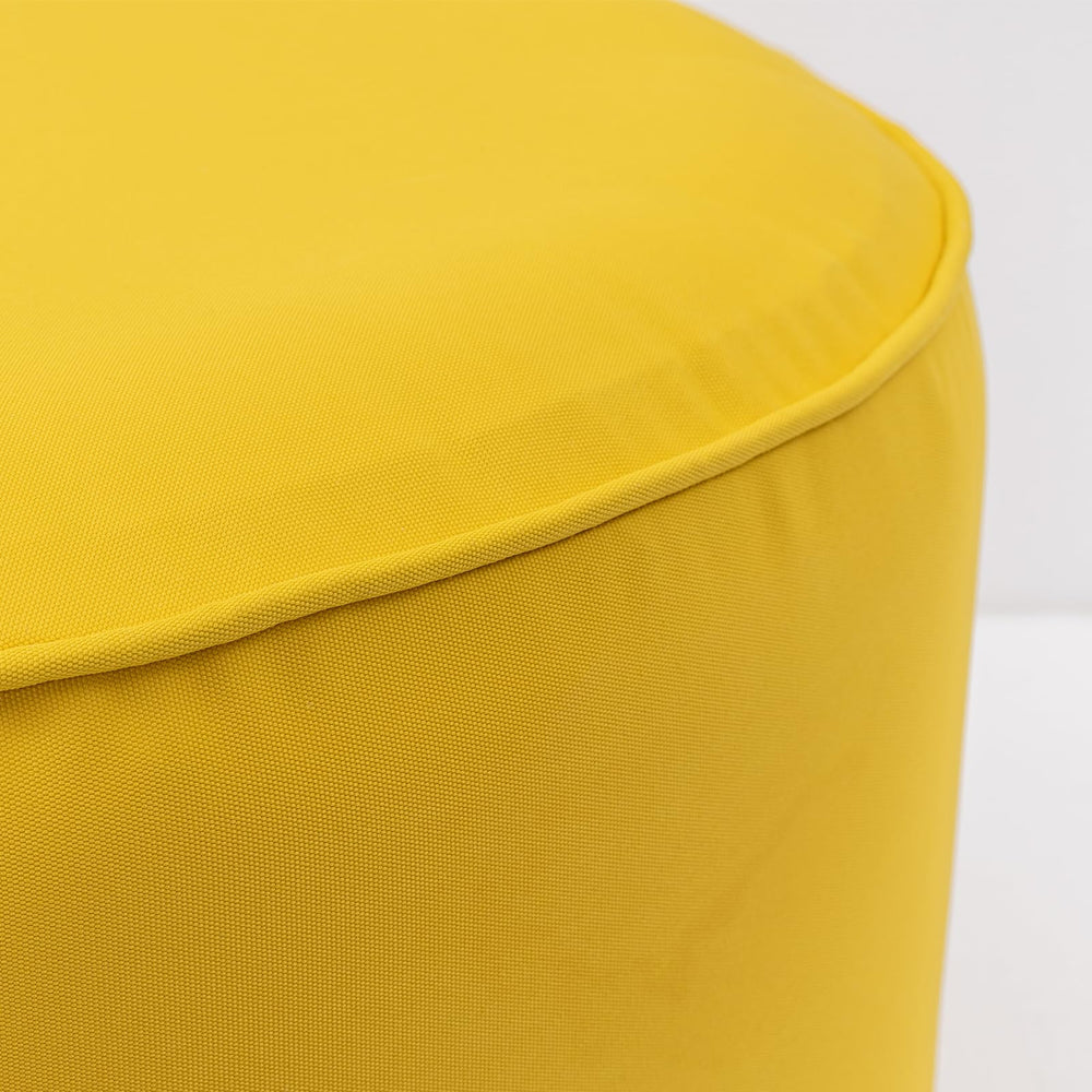 QILLOWAY ottoman folded and packed showing portability and space-saving travel benefit