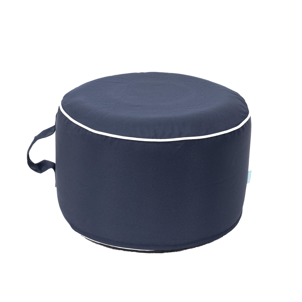 QILLOWAY ottoman front view showing stable round design and comfort