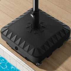 QNCZ umbrella base front view showing sturdy black design and stability benefit