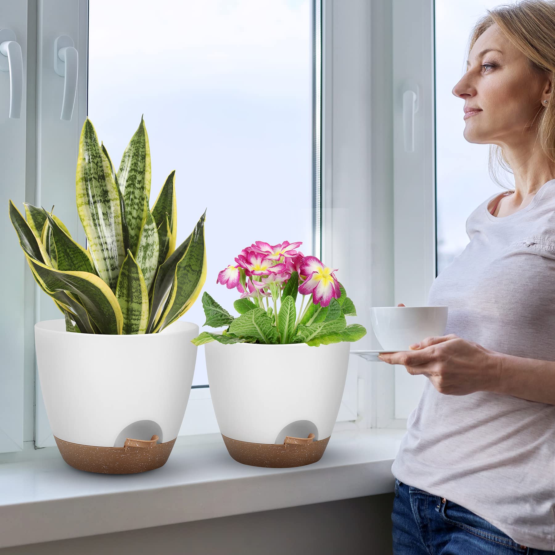 QRRICA balcony setting with pots displaying stylish low-maintenance plants