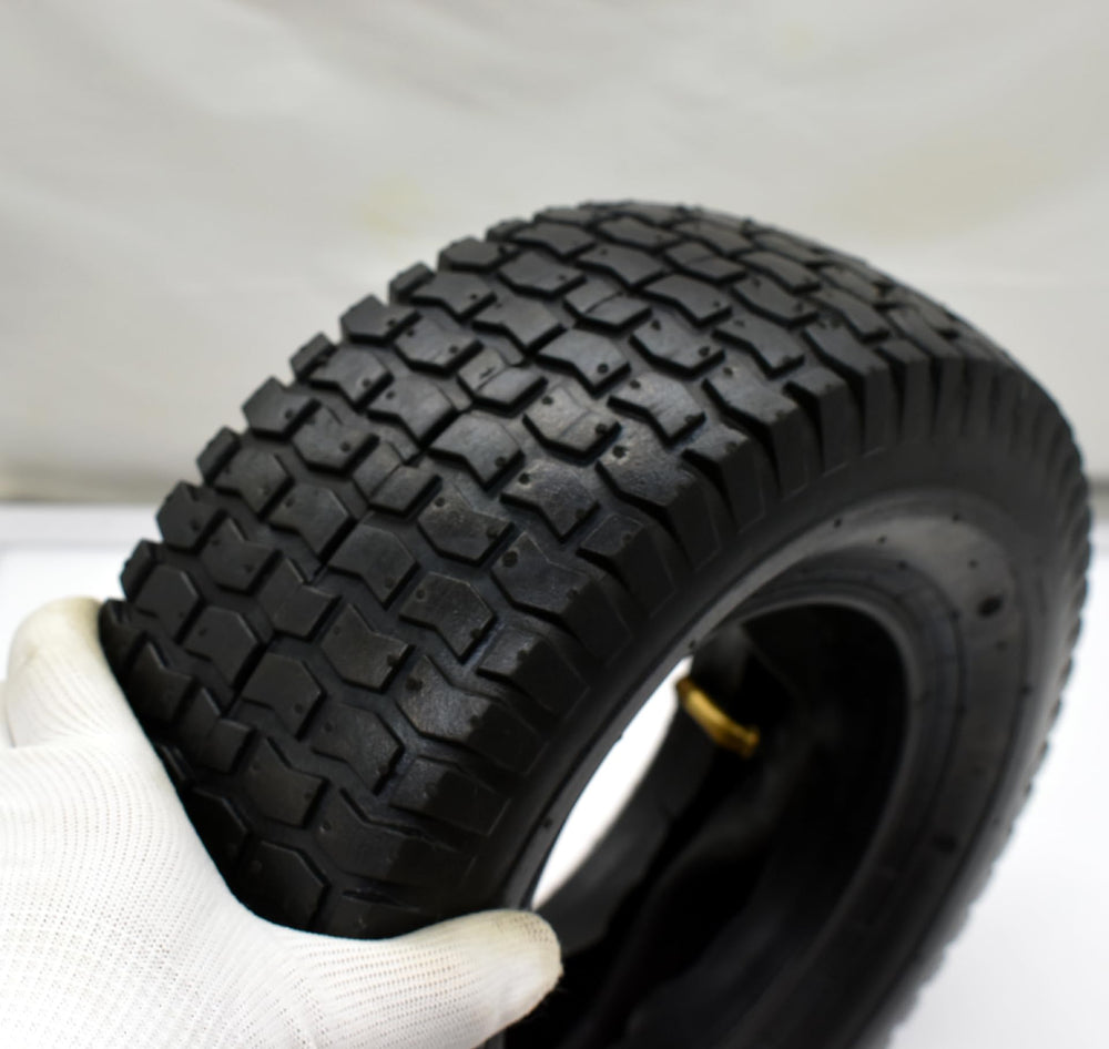 QsEzDo tire next to ruler showing accurate 13-inch diameter and correct fit benefit