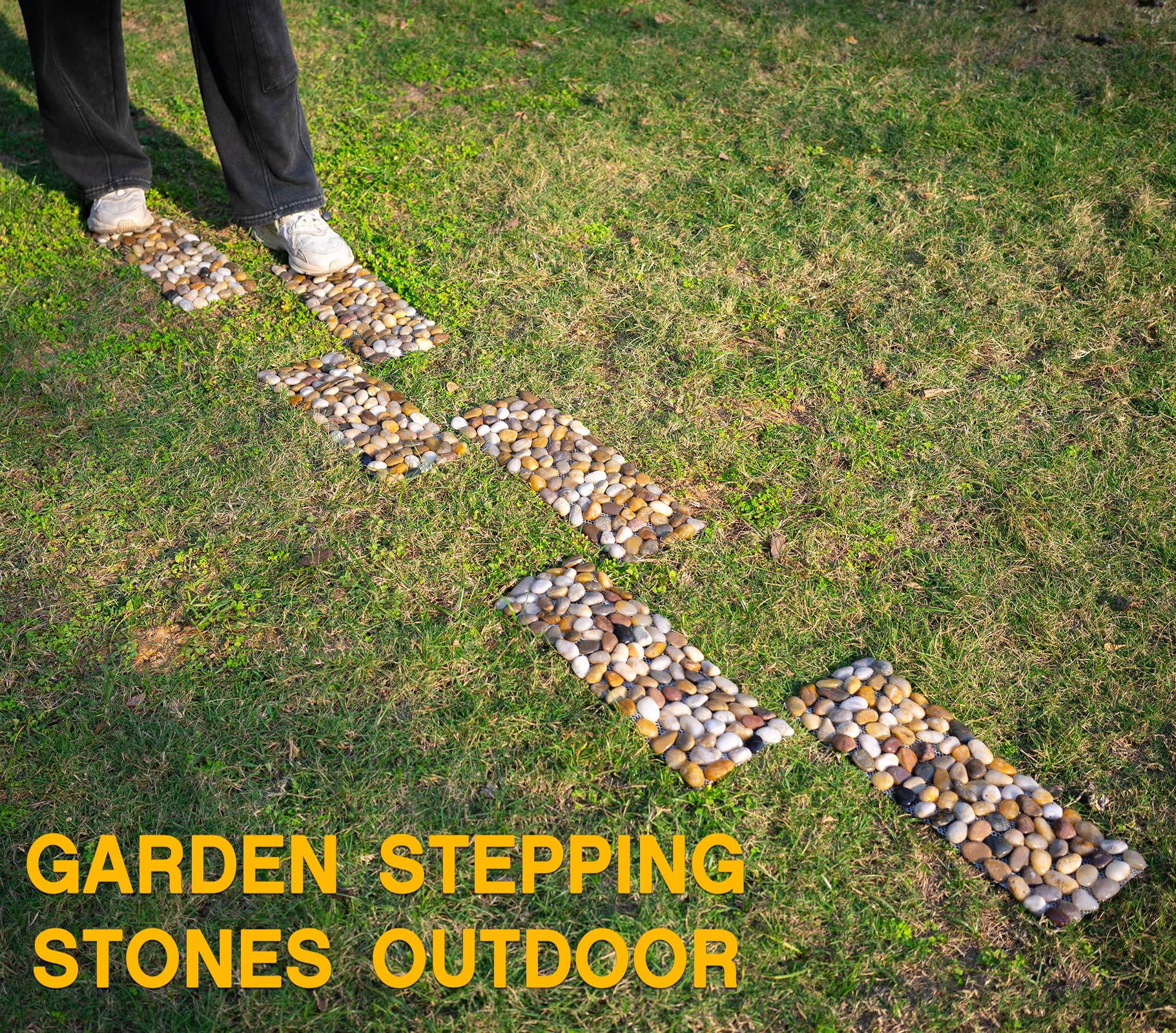 Qualdout garden lifestyle evening shot, highlights ambient pathway appeal and mood