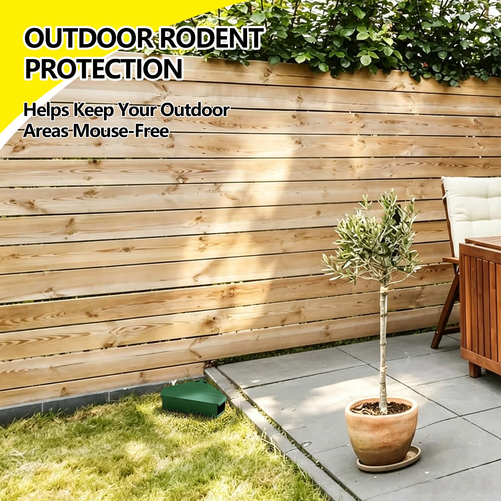 Qualirey bait station in garage corner showing weather-resistant outdoor placement benefit
