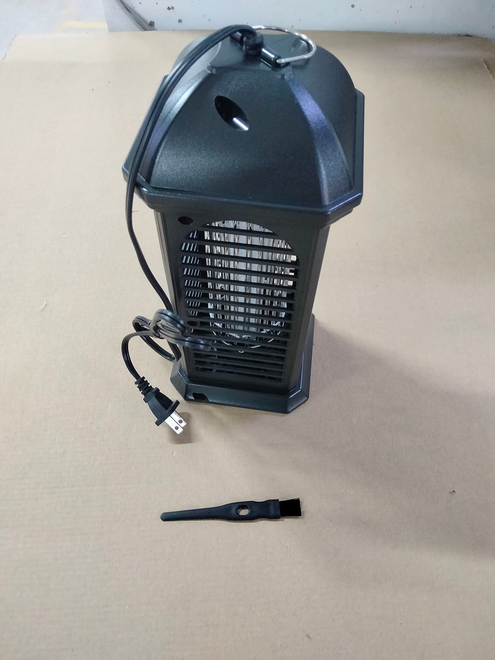 Qualirey box contents laid out showing three lamps and accessories for immediate use