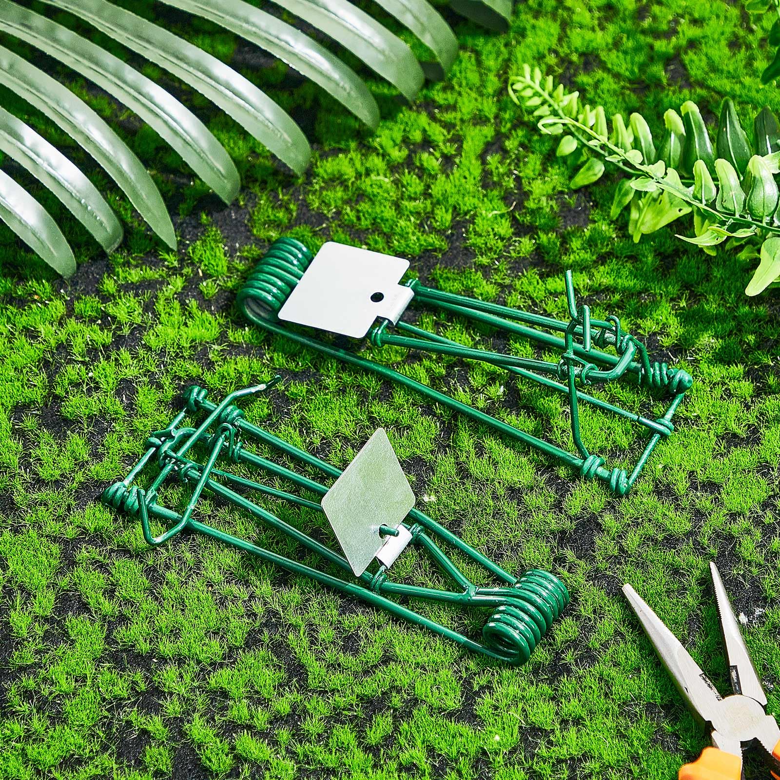 Qualirey trap next to hand for scale illustrating compact, easy placement
