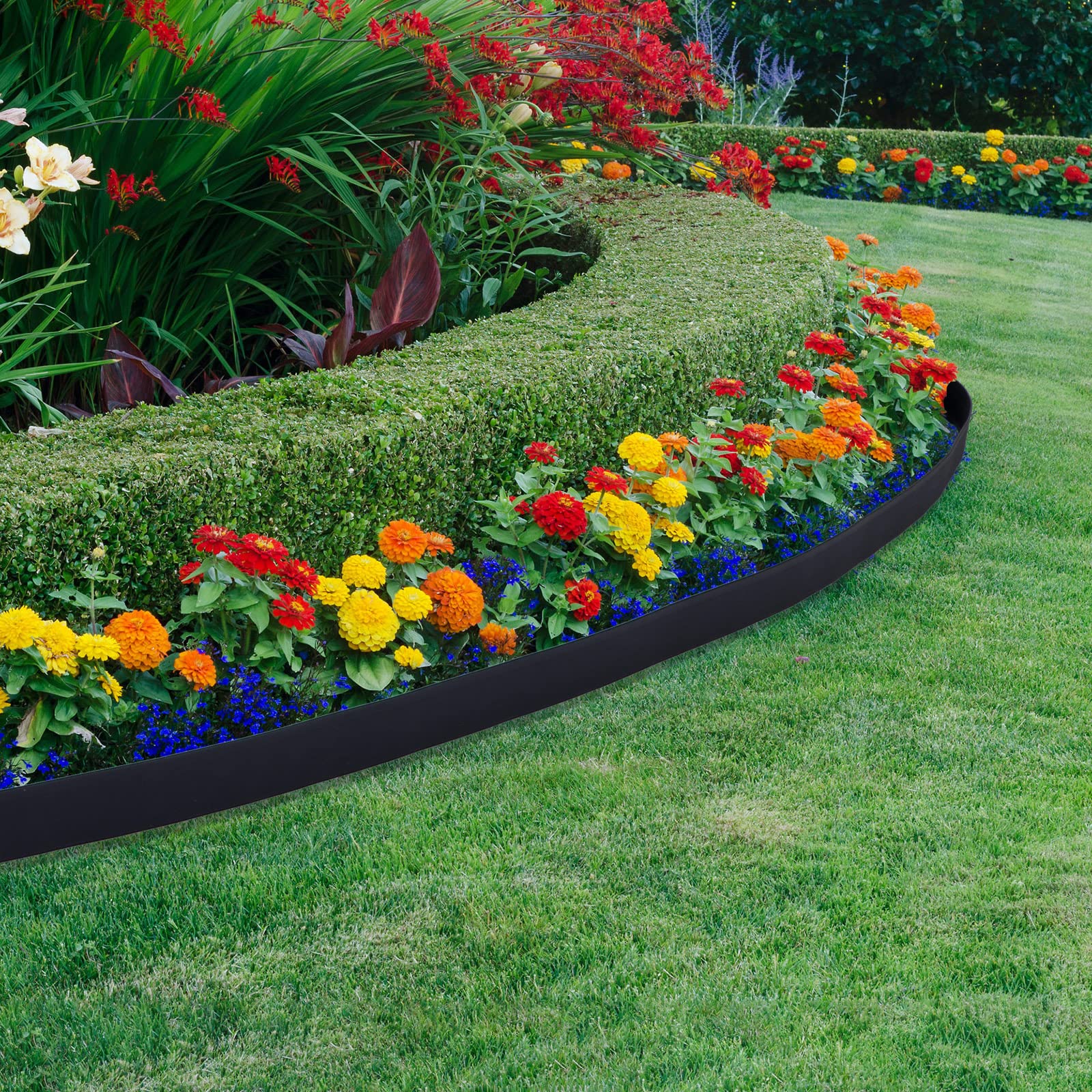 Queekay installed curved garden border around flower bed demonstrating clean edge separation