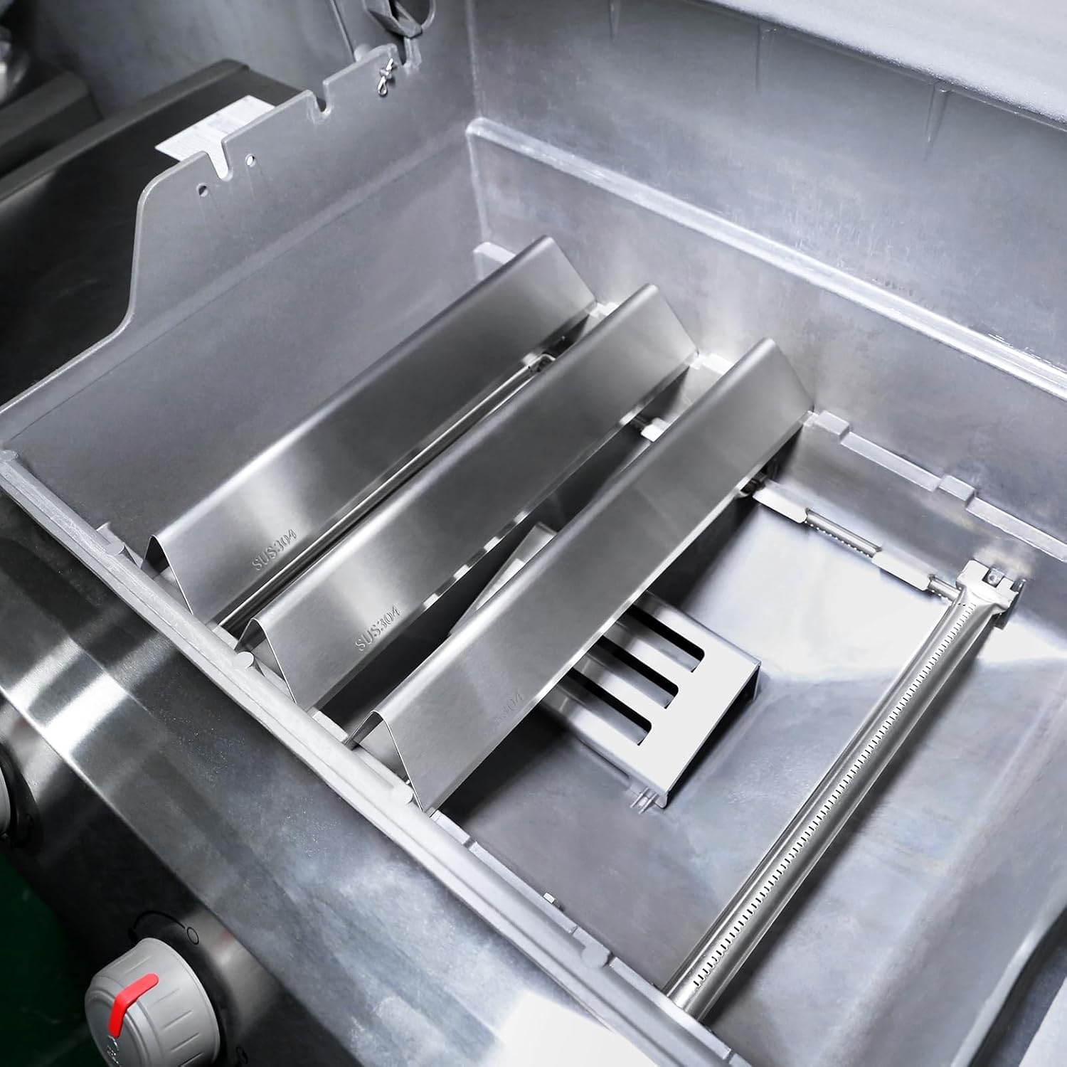 QuliMetal kit en parrilla durante asado, durabilidad y menor mantenimiento