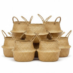 Qunclay front view of four seagrass baskets showing natural decor appeal