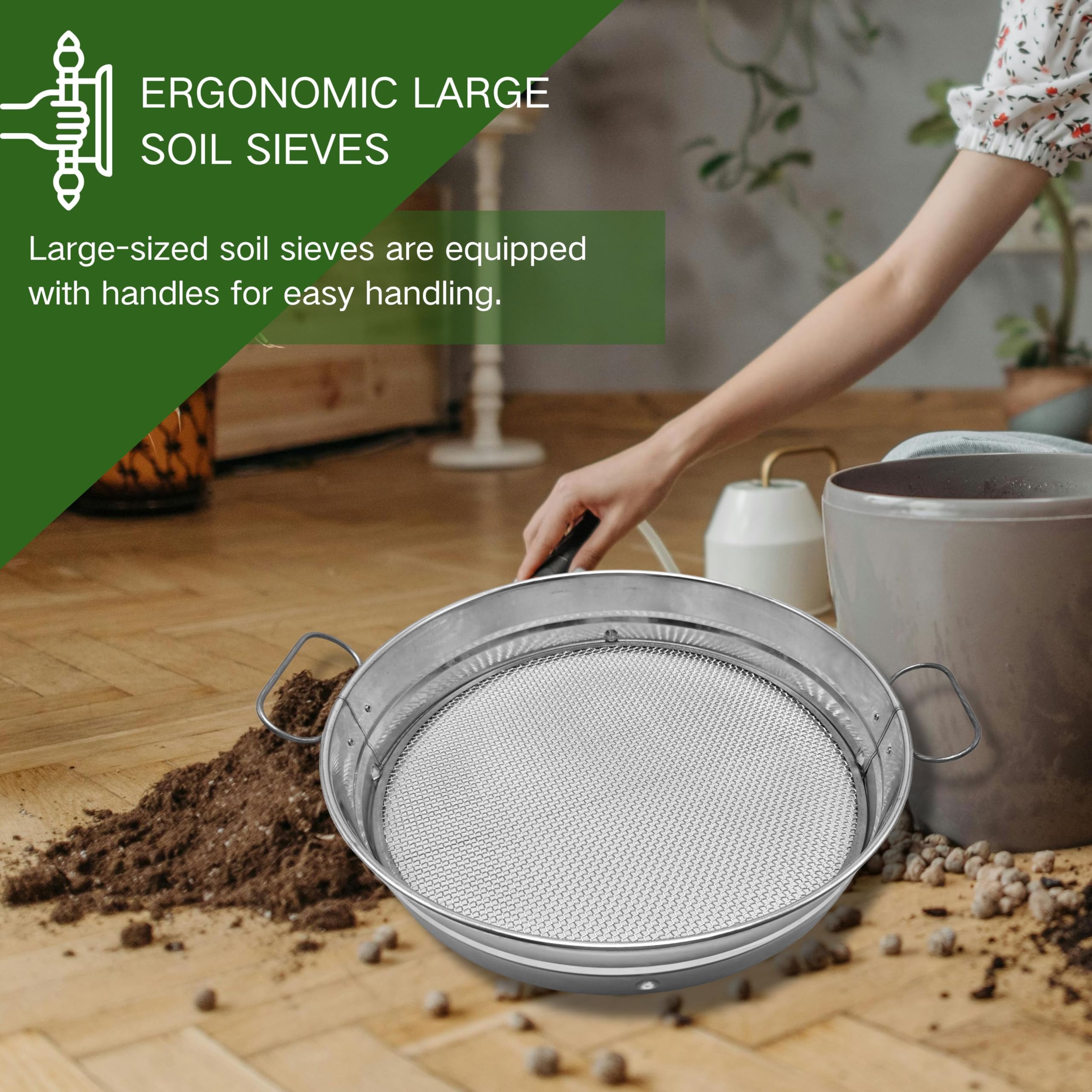 QUTIING sifter in use above a wheelbarrow speeds soil separation on site