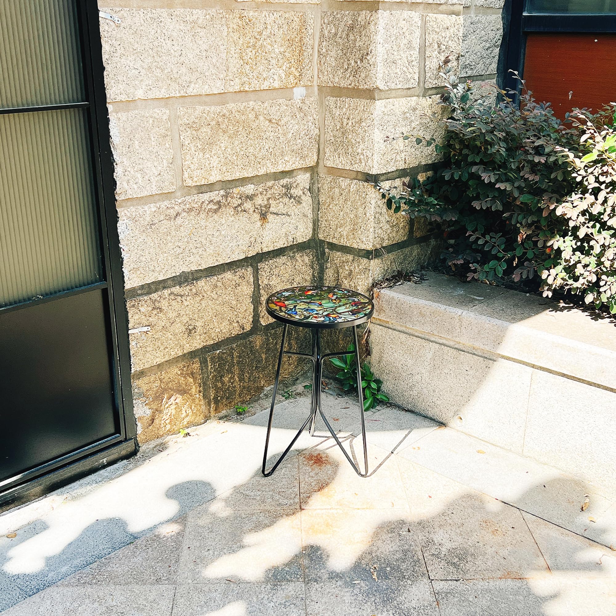 QZXYGY table used as plant stand demonstrating decorative and functional use